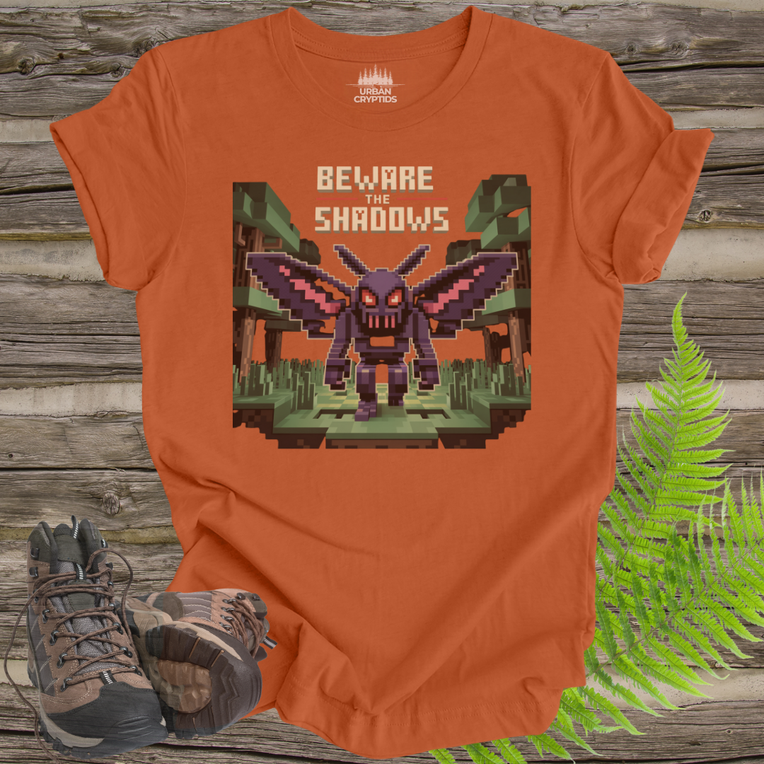 Beware the Shadows – Pixel Mothman T-Shirt
