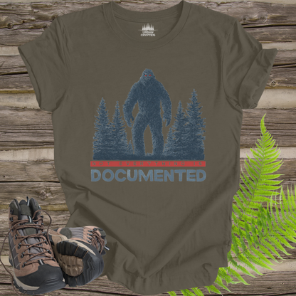 “Not Everything Is Documented” Bigfoot T-Shirt – Cryptid Warning Statement Tee