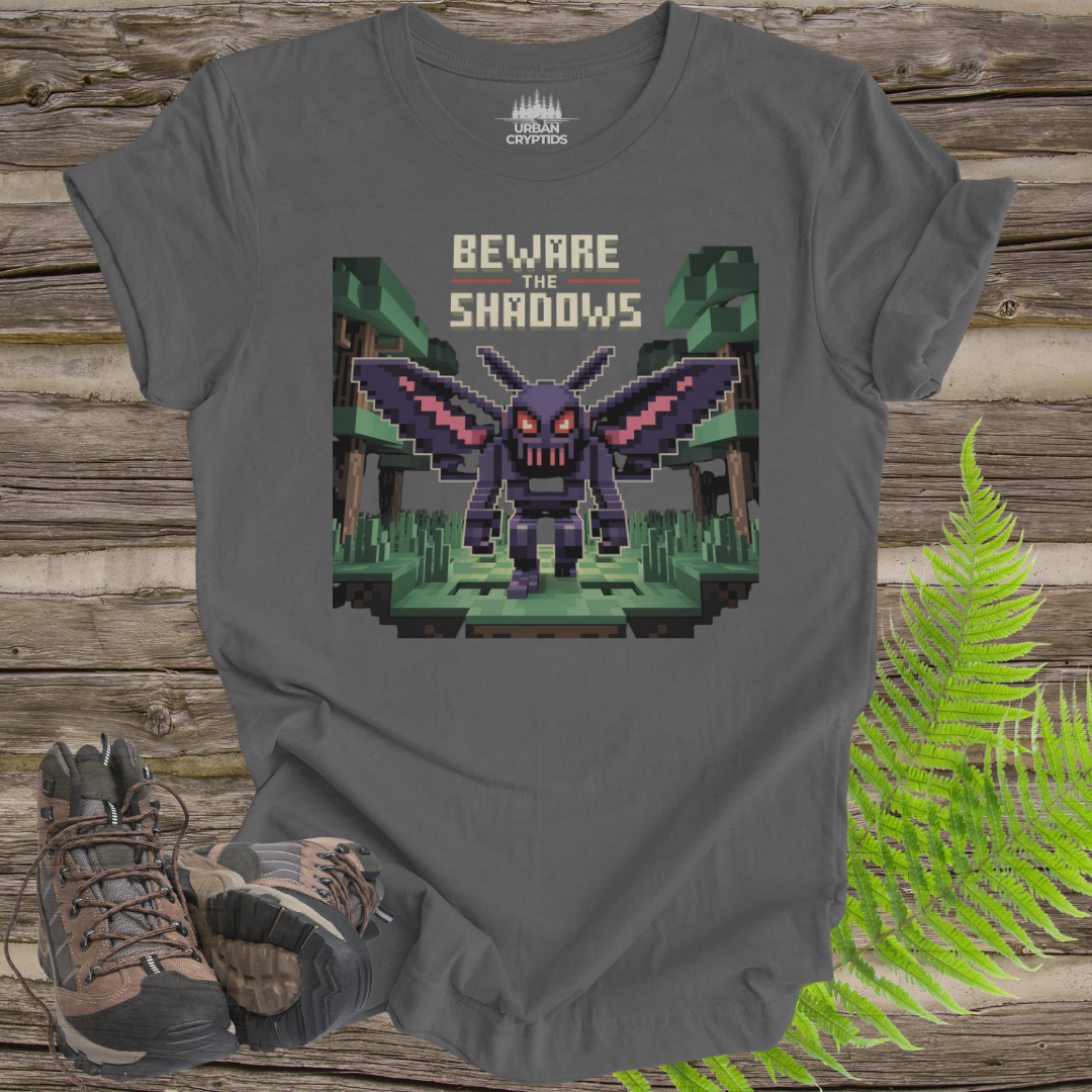 Beware the Shadows – Pixel Mothman T-Shirt