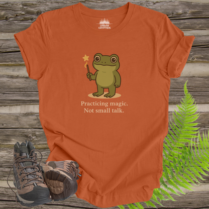 Loveland Frogman “Practicing Magic, Not Small Talk” Tee – Funny Cryptid Shirt for Paranormal Fans