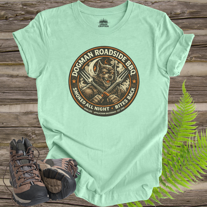 Dogman Roadside BBQ Shirt | Cryptid Town Tee | Smoked All Night Bites Back Werewolf BBQ Vintage Badge