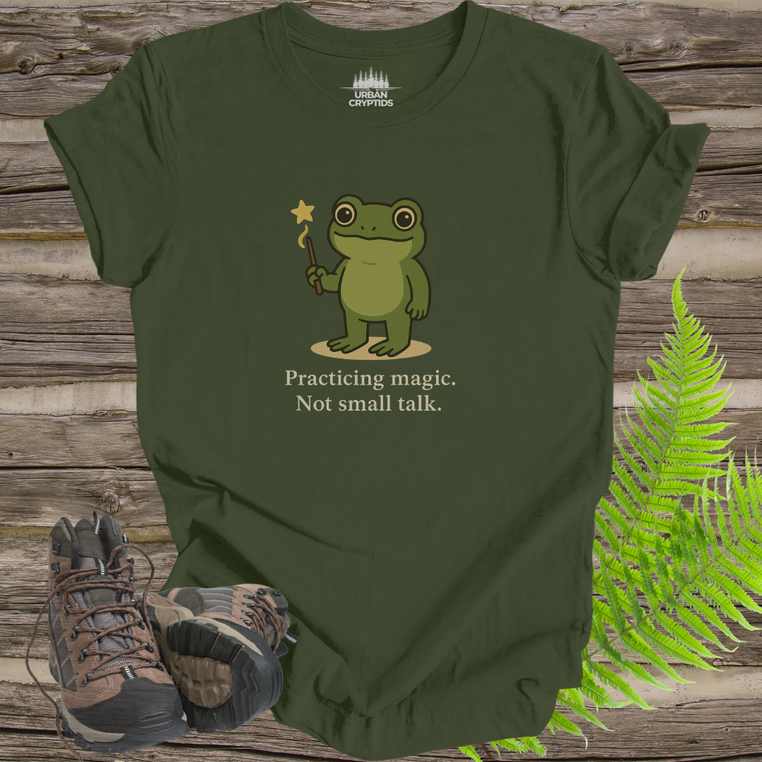 Loveland Frogman “Practicing Magic, Not Small Talk” Tee – Funny Cryptid Shirt for Paranormal Fans