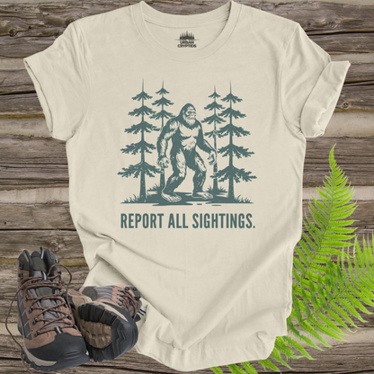 Bigfoot “Report All Sightings” T-Shirt – Vintage Cryptid Forest Design